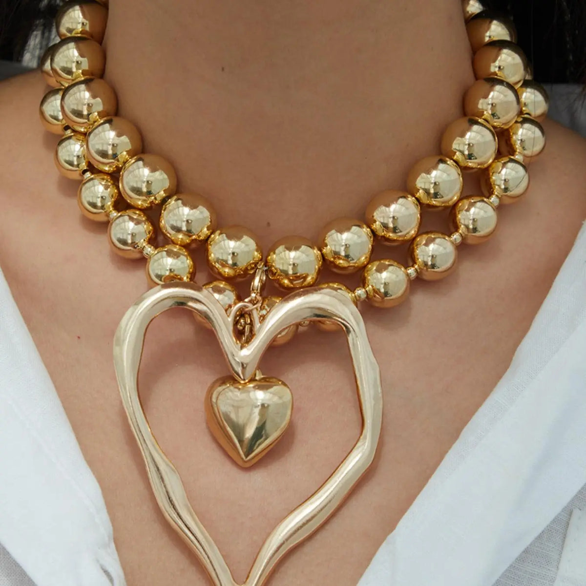 Gold-Tone Beaded Necklace with Heart Pendants
