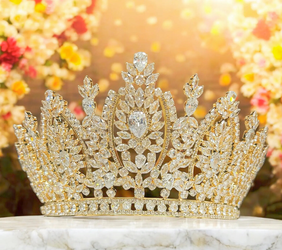 Gold Tone Crystal Crown with Leaf Shaped Stones